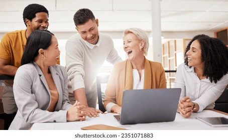 Three people laughing at a ThinkPad — the stock photo from slide seven